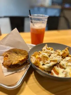 Colorful drink and food on a plate from Candelaria