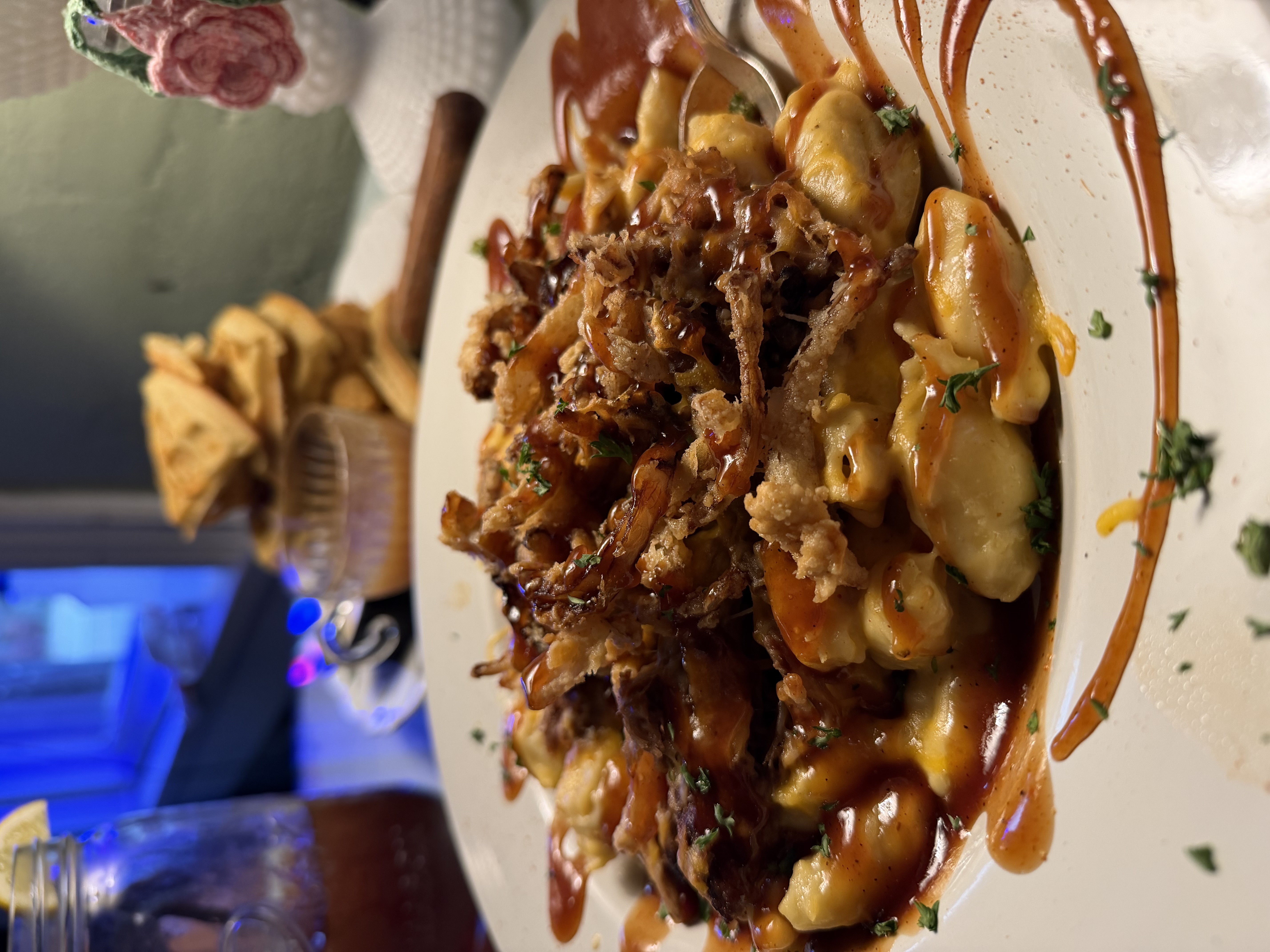 Voodoo Mac & Cheese dish with pork and crispy onion toppings